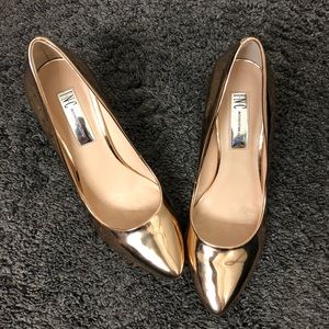 INC gold pumps